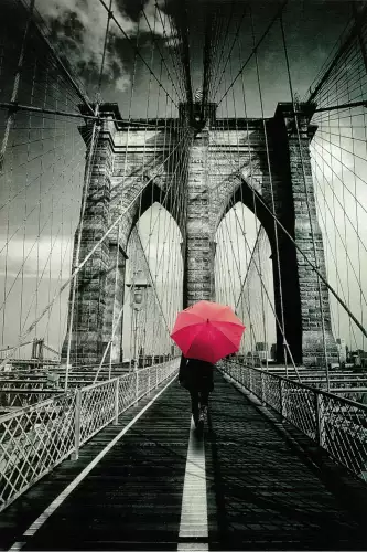 MondiLab Man with umbrella on bridge  (101612)