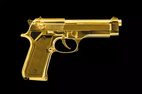 MondiLab Isolated golden pistol  (103513)